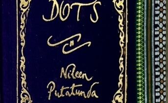 A sample cover of the book: midnight blue coloured handloom sari with gold embossed nameplate and lettering for the title and author's name. The border of the sari lines the right hand margin of the cover.
