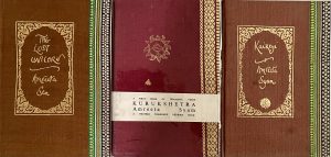 Cover images of three books by Amreeta Sen, placed horizontally. The first and third books are bound in brown saris and the book in the centre in a maroon sari. The border of the saris lines the righthand margin of each book.