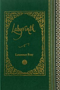 A sample cover of the book: green handloom sari with gold embossed nameplate and lettering for the title and author's name. The border of the sari lines the right hand margin of the cover.